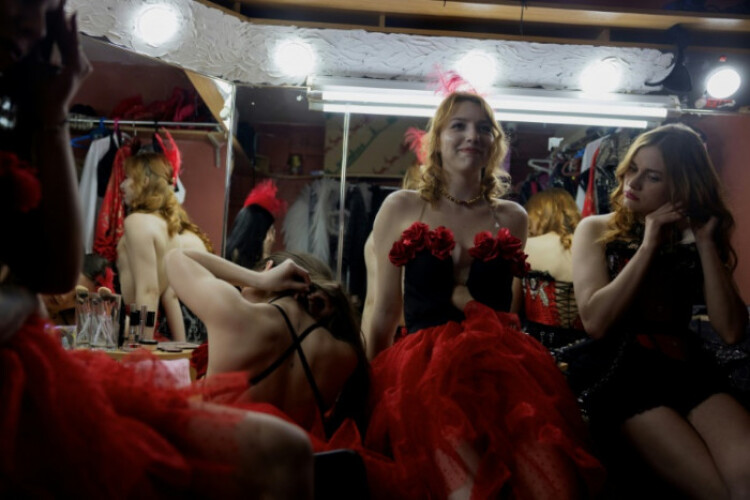 In a Ukrainian strip club, war is laid bare