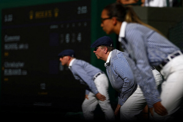 Wimbledon calls time on line judges